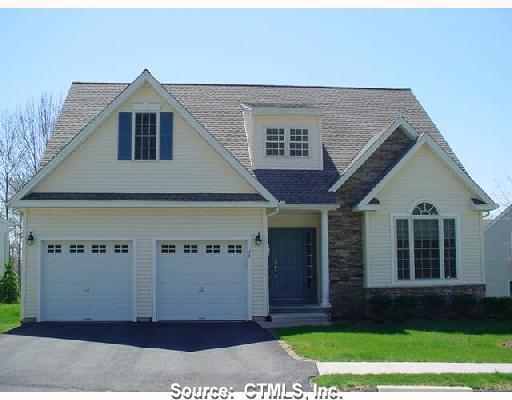 27 Montgomery Road, Unit 27 Northford, CT 06472 - Photo 1 of 1 a front view of a house with a yard