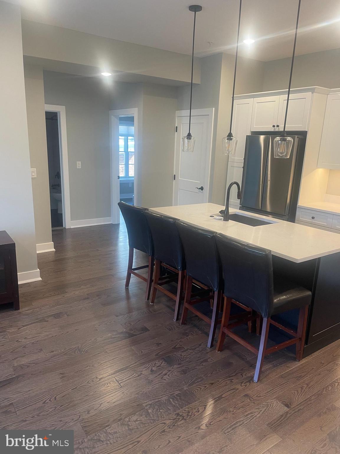 203 Kings Highway East, Unit A2 Haddonfield, NJ 08033 - Photo 2 of 9 a dining room with furniture and window