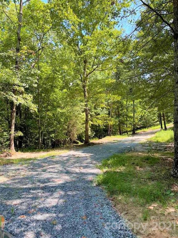 0 North Highland Road, Unit 6 Mill Spring, NC 28756 - Photo 3 of 14 a view of outdoor space with deck and trees