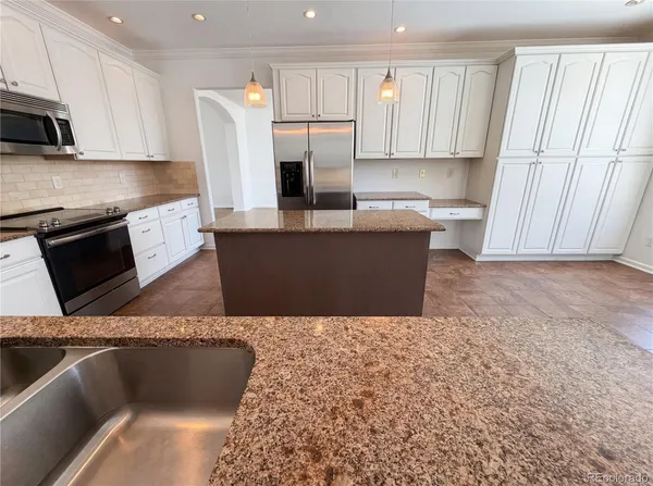 $815,000 | 5817 South Espana Street, Aurora, CO 80015