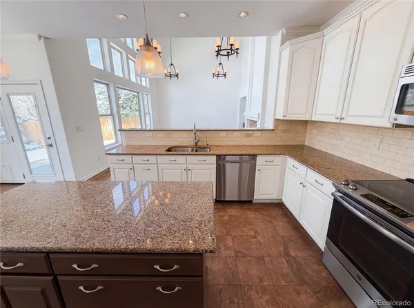$815,000 | 5817 South Espana Street, Aurora, CO 80015