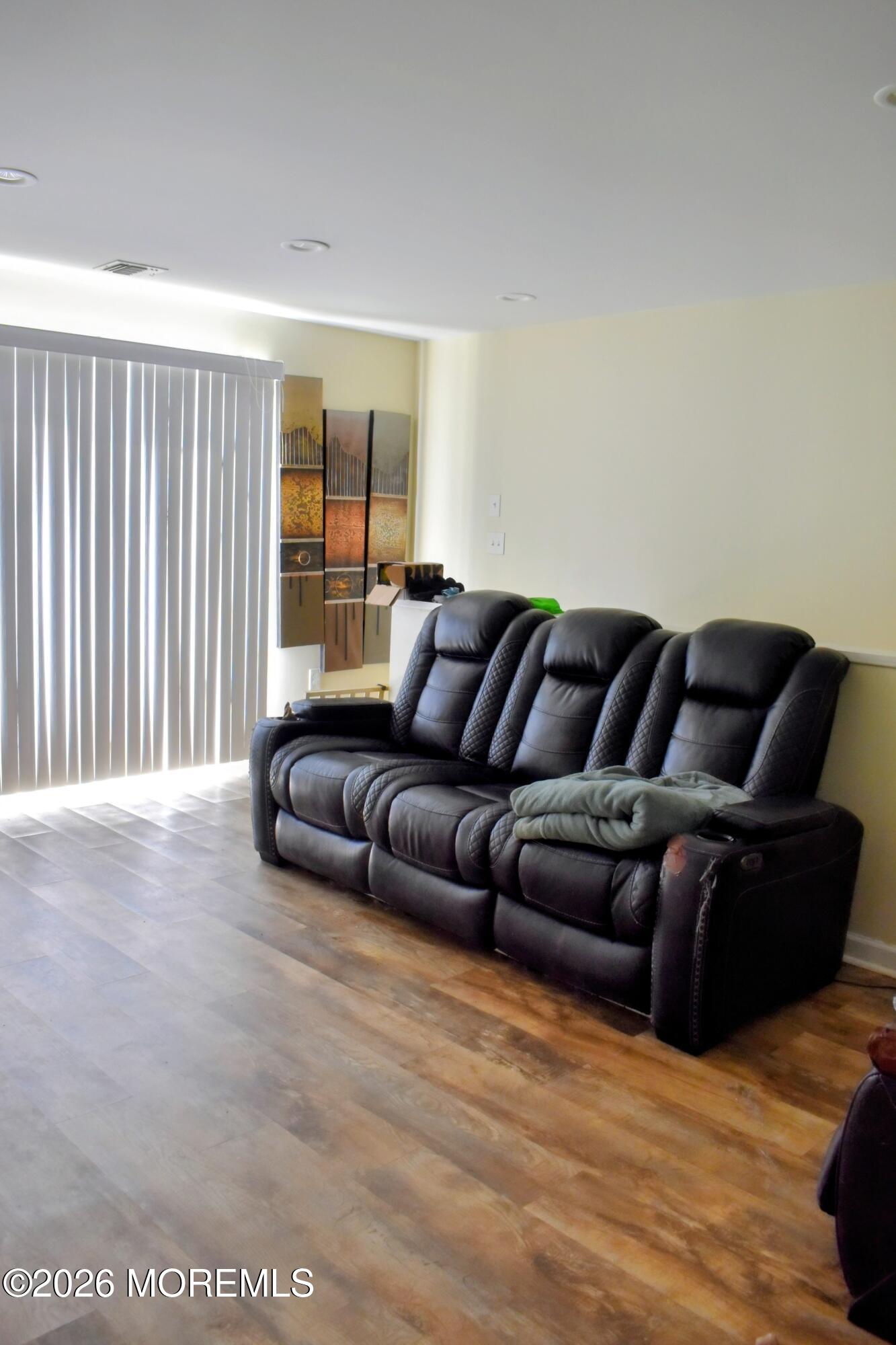 151 1st Street Keyport, NJ 07735 - Photo 16 of 24 a living room with furniture and a couch