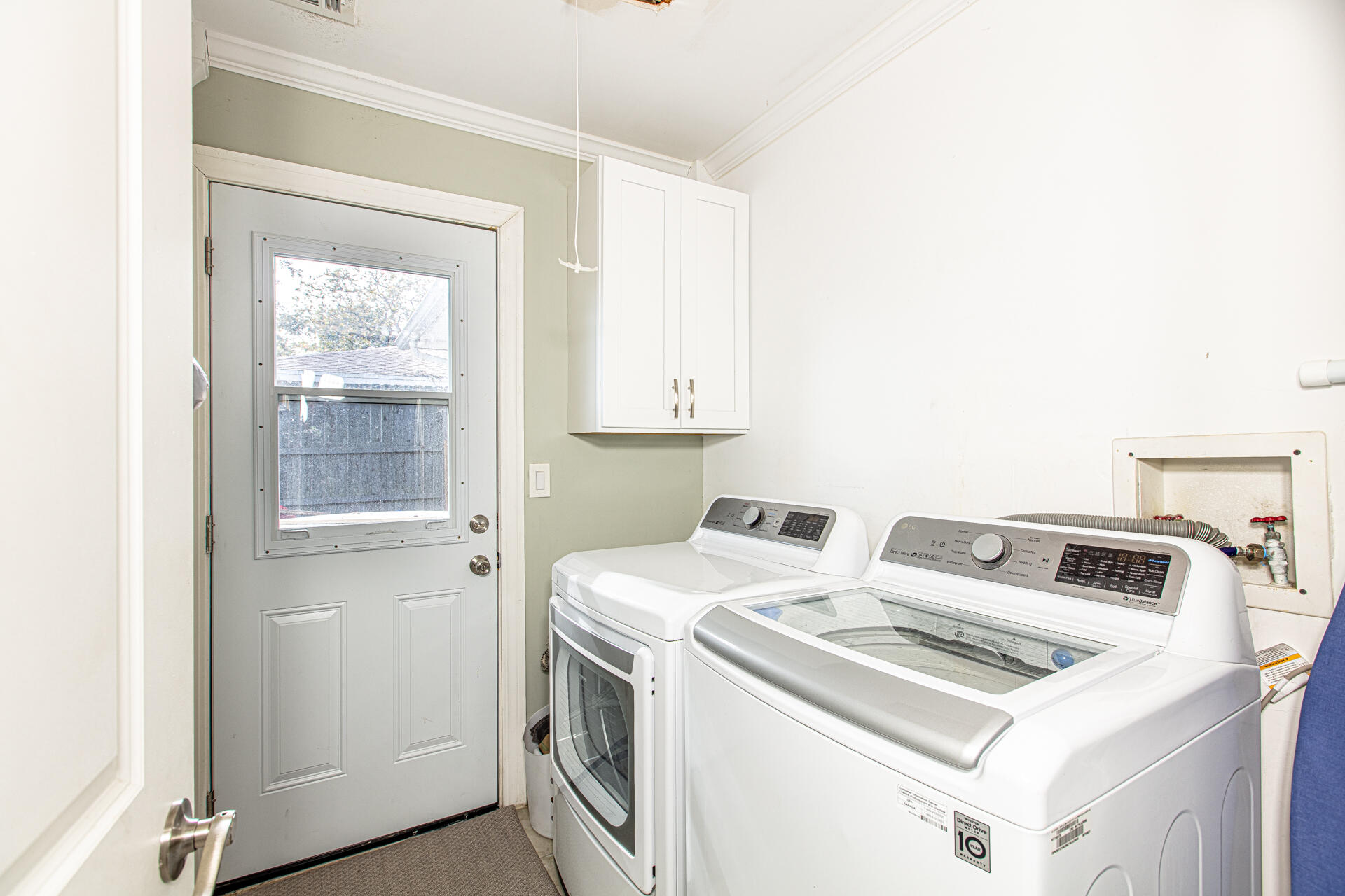 1013 Gloria Avenue Fort Walton Beach, FL 32547 - Photo 16 of 31 a utility room with dryer and washer