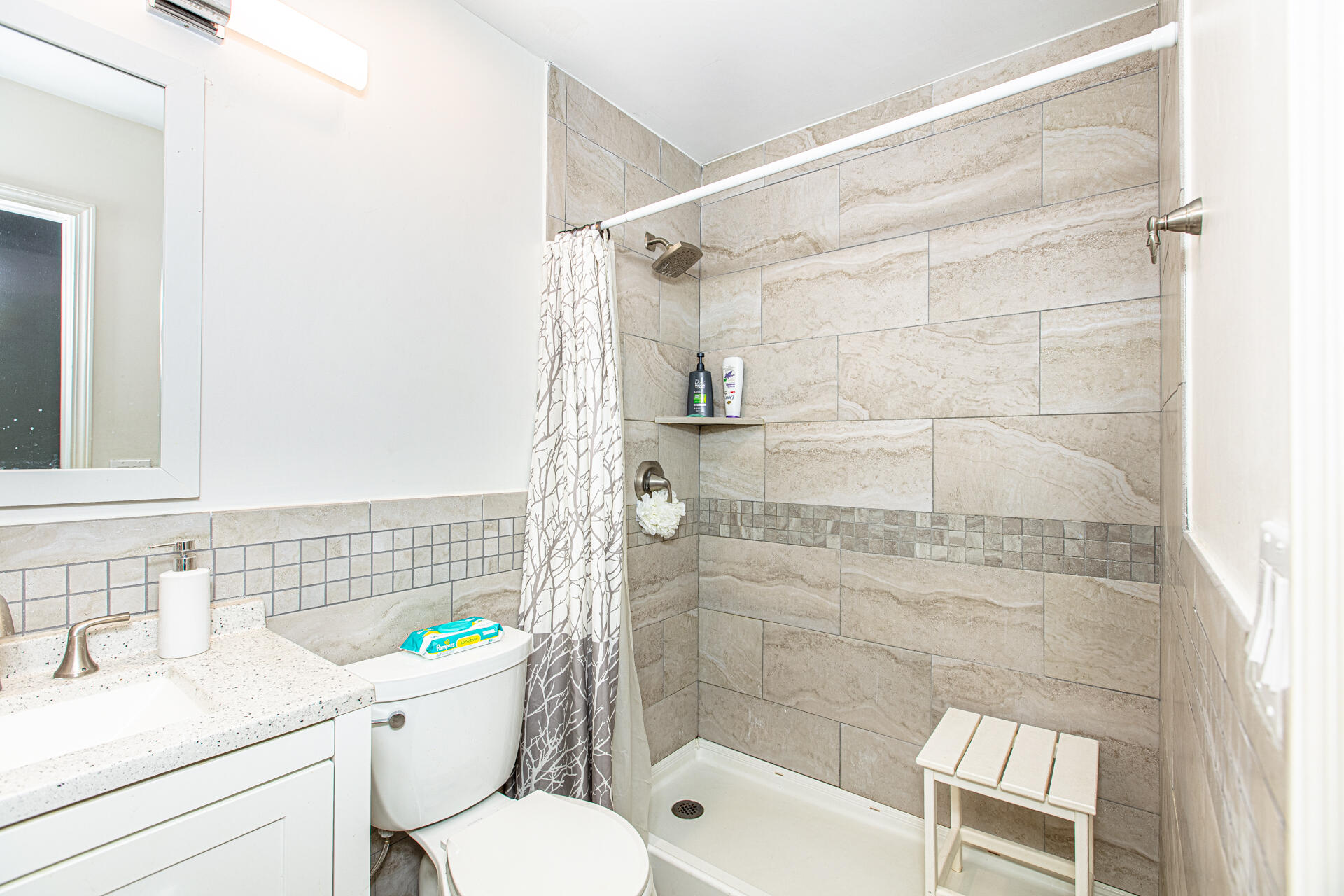 1013 Gloria Avenue Fort Walton Beach, FL 32547 - Photo 19 of 31 a bathroom with a sink toilet and shower