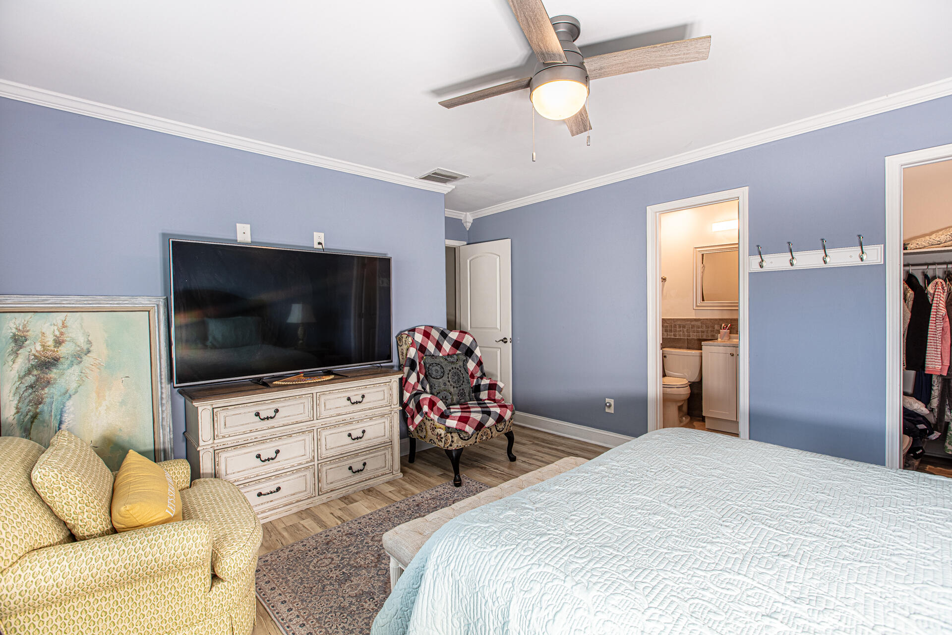 1013 Gloria Avenue Fort Walton Beach, FL 32547 - Photo 22 of 31 a bedroom with a bed and a flat screen tv