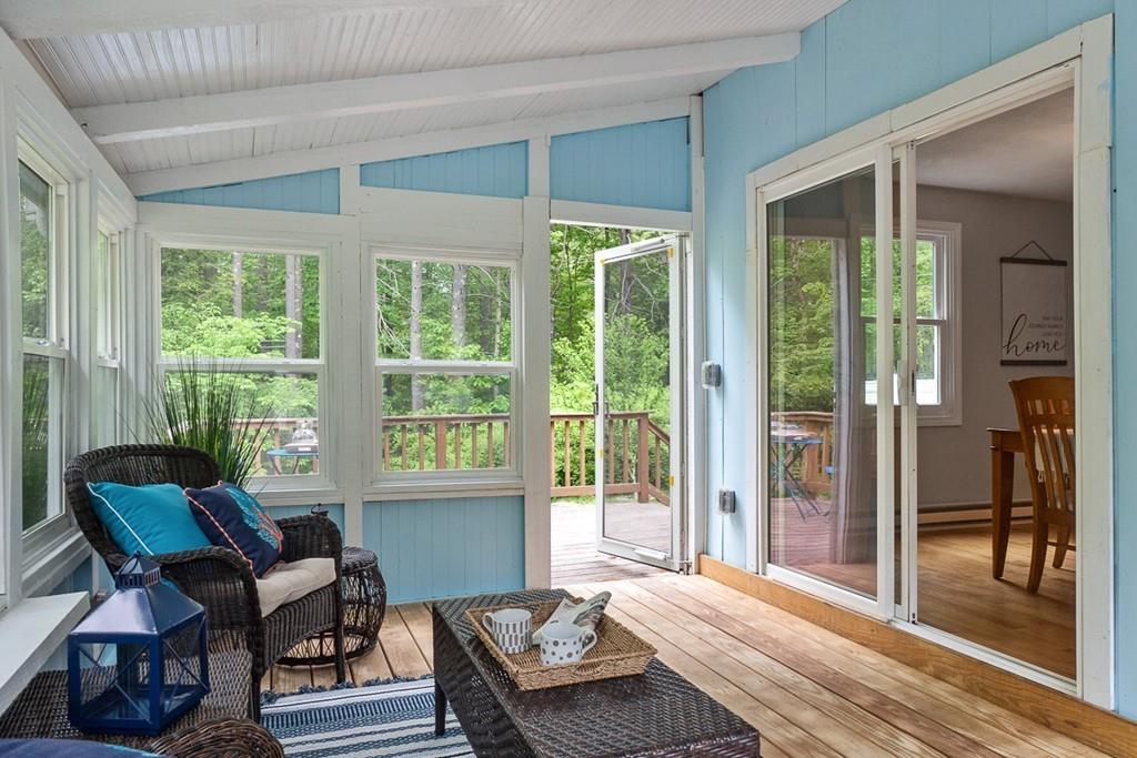 684 Burroughs Road Boxborough, MA 01719 - Photo 15 of 30 a bedroom with a bed and wooden floor