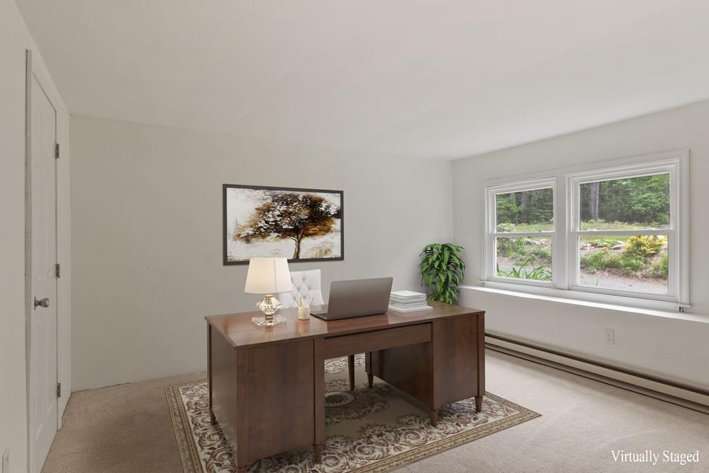 684 Burroughs Road Boxborough, MA 01719 - Photo 25 of 30 a living room with furniture and a window