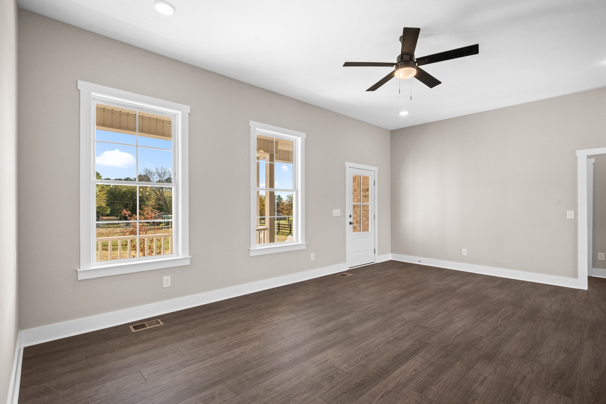 4108 Airport Road Springfield, TN 37172 - Photo 7 of 50 a view of a livingroom with a ceiling fan and window