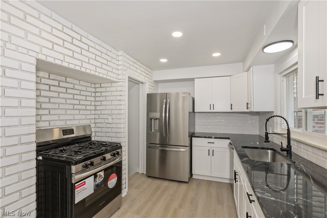 17917 McCracken Road Maple Heights, OH 44137 - Photo 11 of 48 Fully renovated kitchen - granite countertops - SS appliances