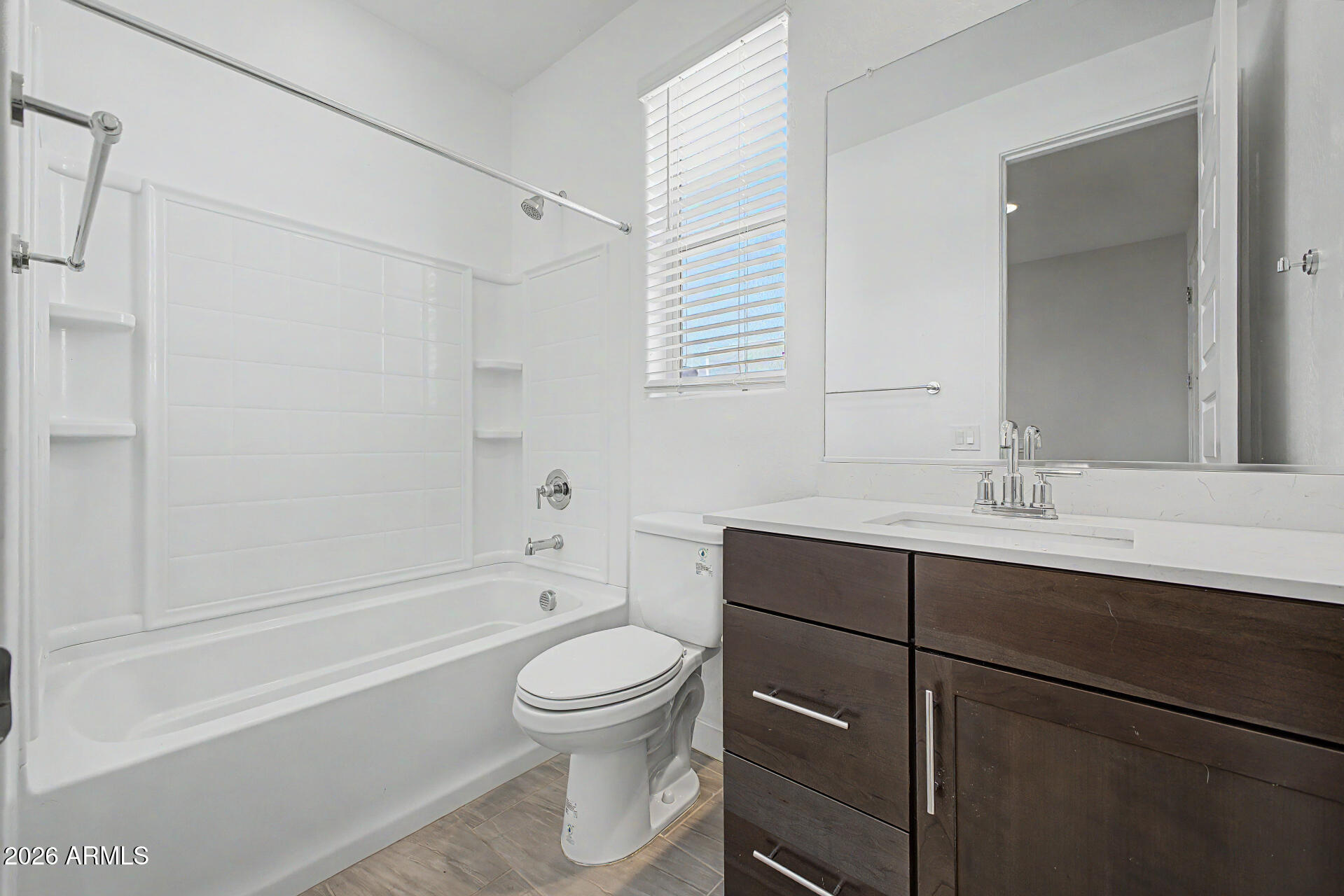 23080 East Stacey Road Queen Creek, AZ 85142 - Photo 36 of 42 a bathroom with a sink toilet and shower