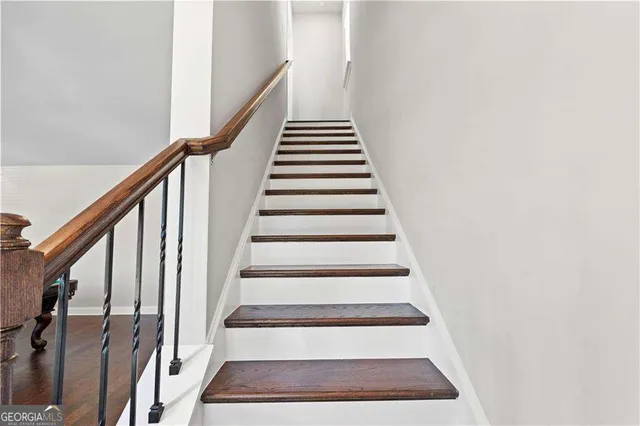 a room with furniture and a wooden floor