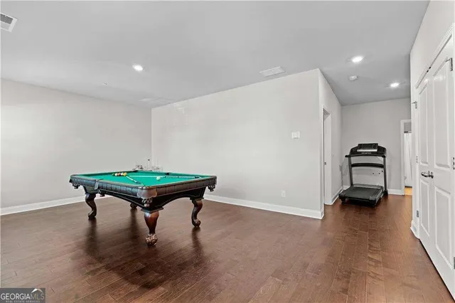 a room with window and wooden floor