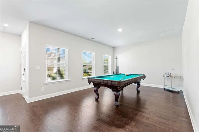 a view of a livingroom with wooden floor