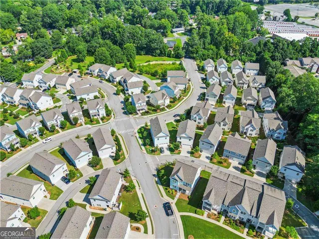 an aerial view of residential house with outdoor space