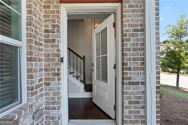 a bathroom with a shower and a mirror