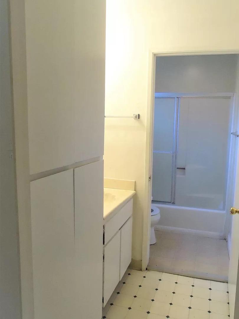 195 East Reed Street, Unit 4 San Jose, CA 95112 - Photo 9 of 11 a bathroom with a bathtub and a shower