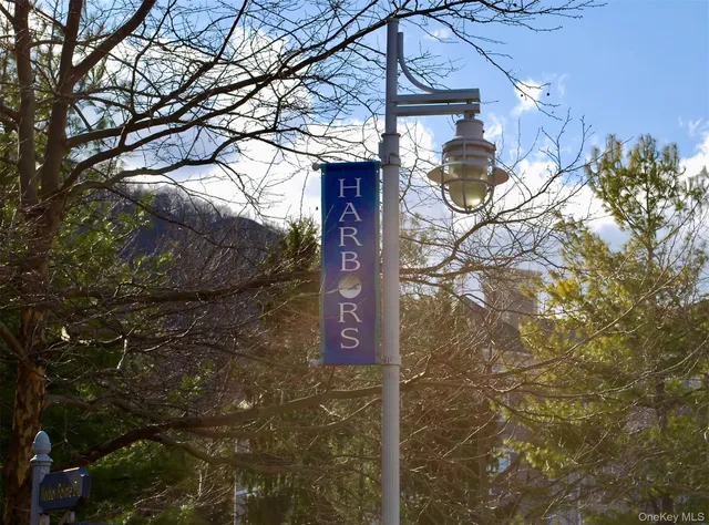 a view of a terrace with wooden floor and lake view