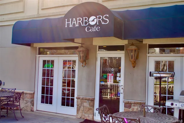 a view of a lake with tall buildings