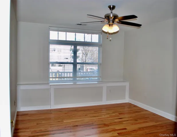 a kitchen with granite countertop a table and chairs in it