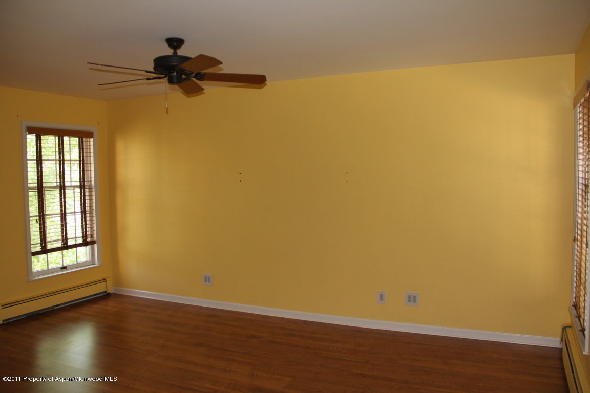 325 Riverside Drive Basalt, CO 81621 - Photo 14 of 25 a view of a room with wooden floor and a window