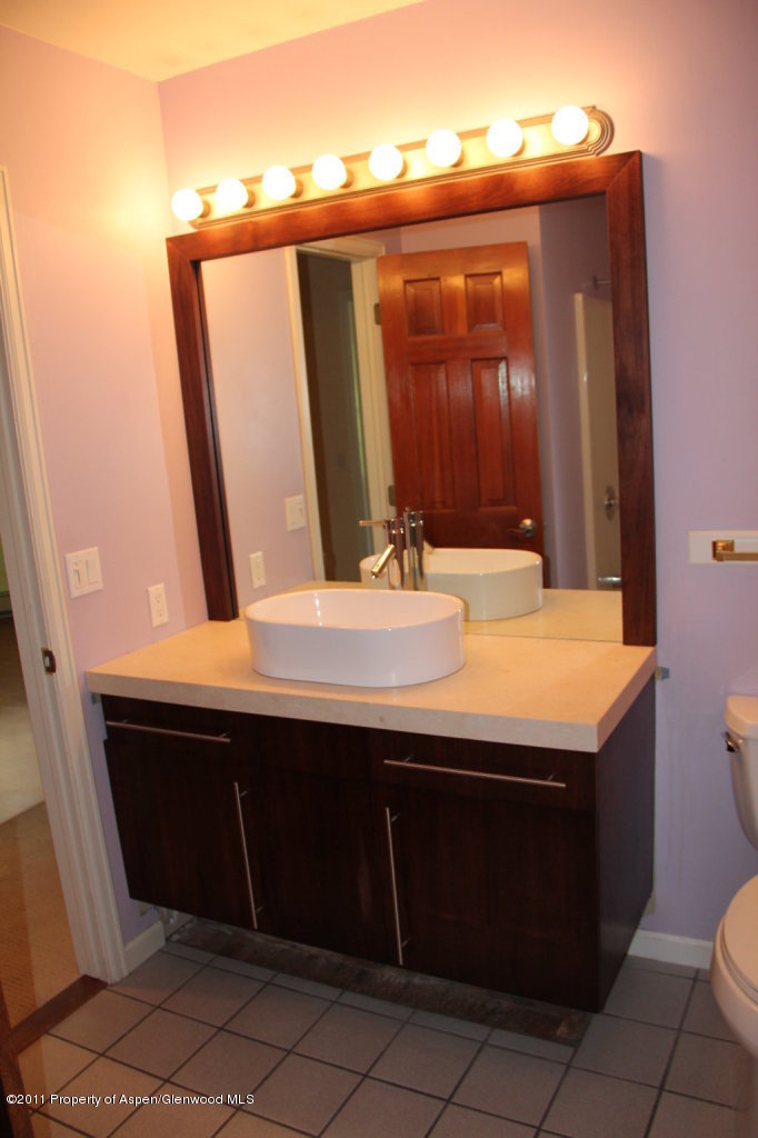 325 Riverside Drive Basalt, CO 81621 - Photo 19 of 25 a bathroom with a sink and a mirror