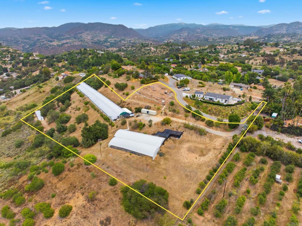 803 Quail Hill Road Fallbrook, CA 92028 - Photo 1 of 36 an aerial view of residential house with an ocean
