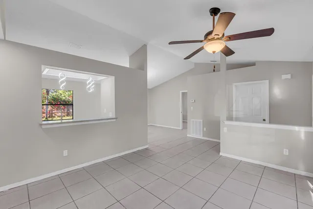 a view of an empty room and window