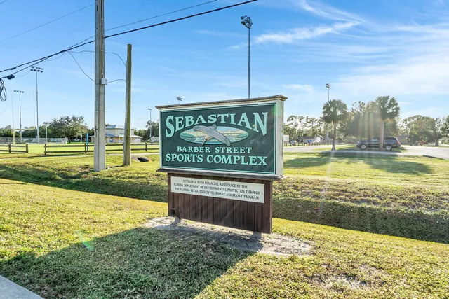 a view of an ocean with a swimming pool