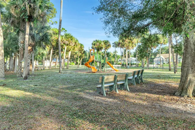 a view of a park with swings