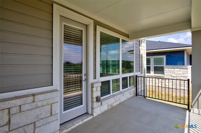 a view of entrance gate of the house