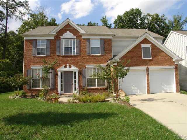 708 Willingham Road Morrisville, NC 27560 - Photo 1 of 1 a front view of a house with a yard and garage