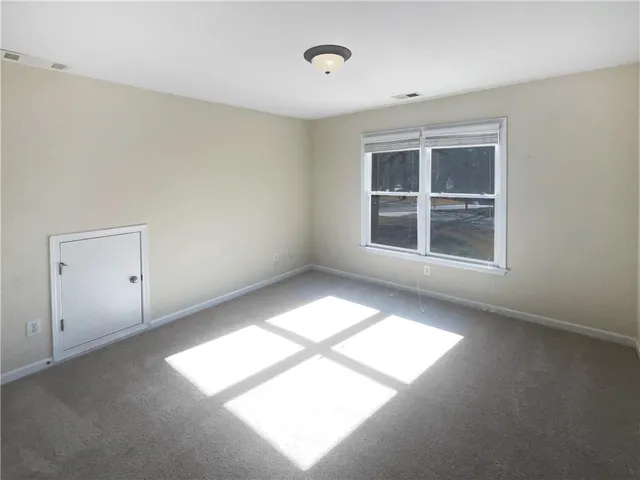 an empty room with windows