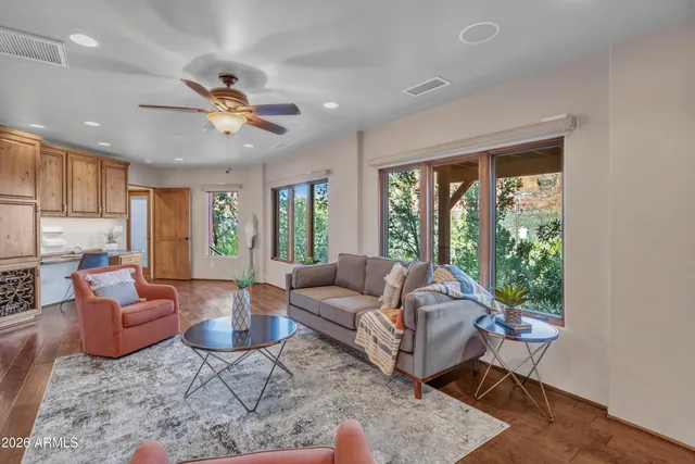 a view of a chairs and table in the patio