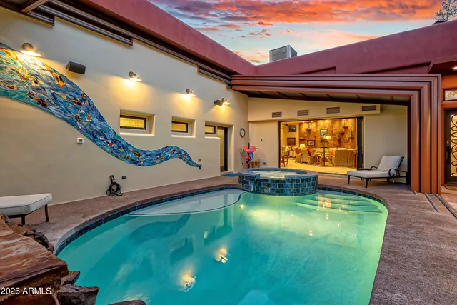 a balcony with furniture and city view