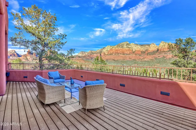 a view of a chairs and table on the terrace