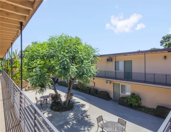 a view of a balcony with plants