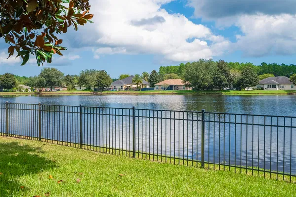 a view of a swimming pool with a lake view