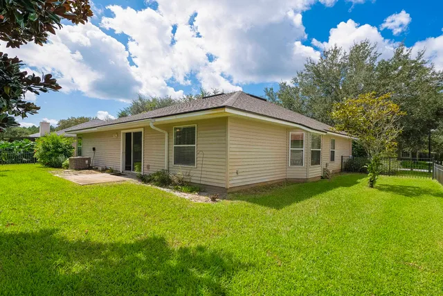 a view of a backyard with a garden