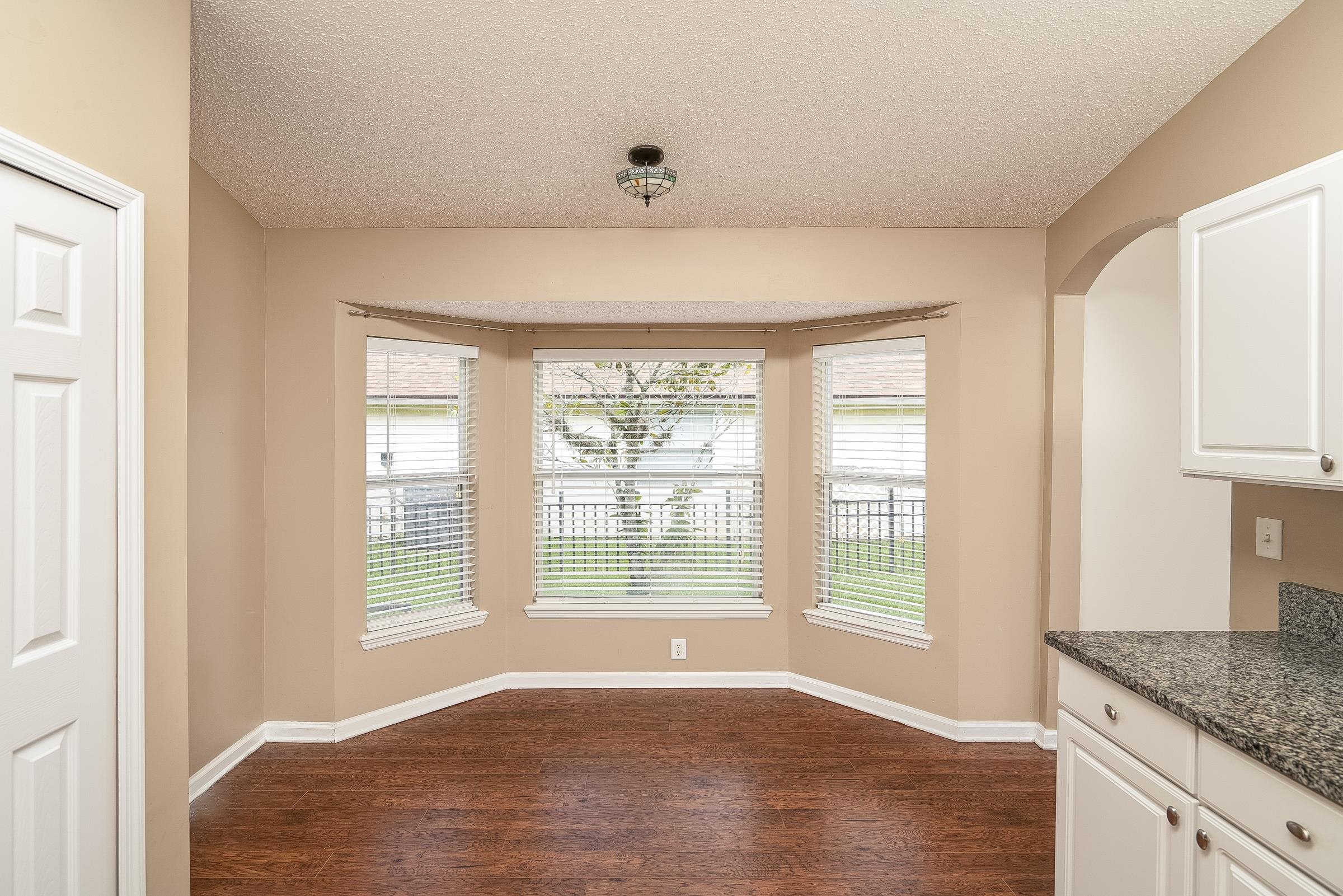 1732 South Summer Ridge Court St. Augustine, FL 32092 - Photo 19 of 42 a view of an empty room with a window