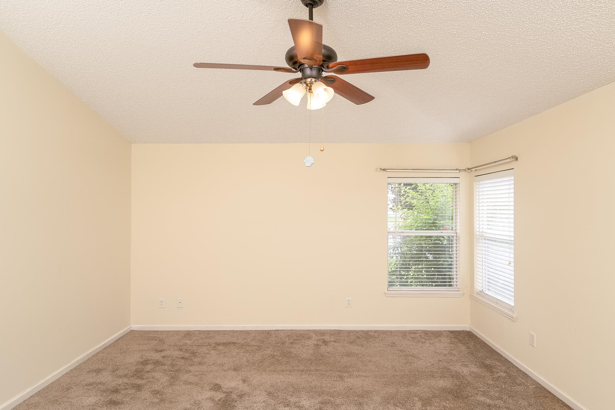 1732 South Summer Ridge Court St. Augustine, FL 32092 - Photo 25 of 42 a view of a room with a window and a ceiling fan