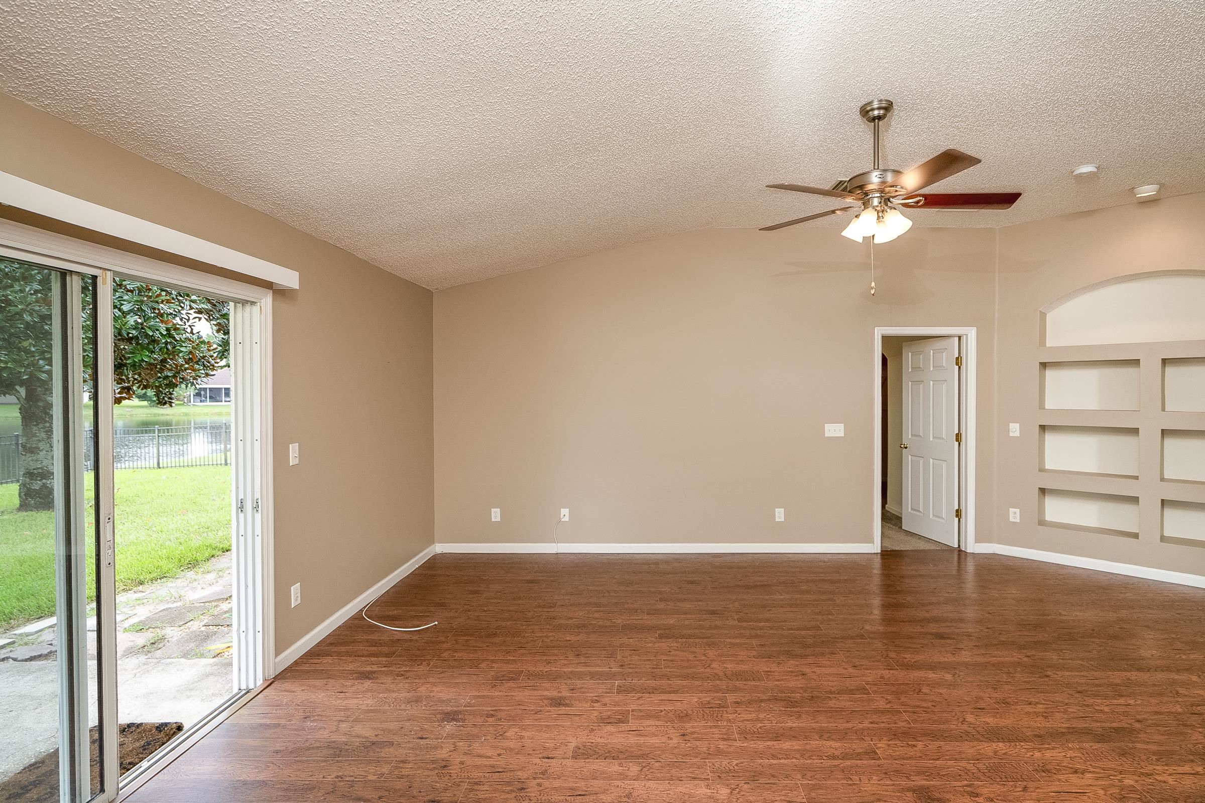 1732 South Summer Ridge Court St. Augustine, FL 32092 - Photo 10 of 42 a view of a room with window and ceiling fan