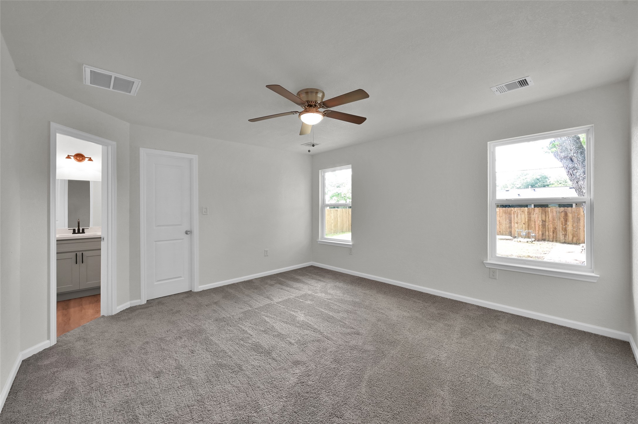 2826 Hopper Road Houston, TX 77093 - Photo 12 of 24 a view of an empty room with a window