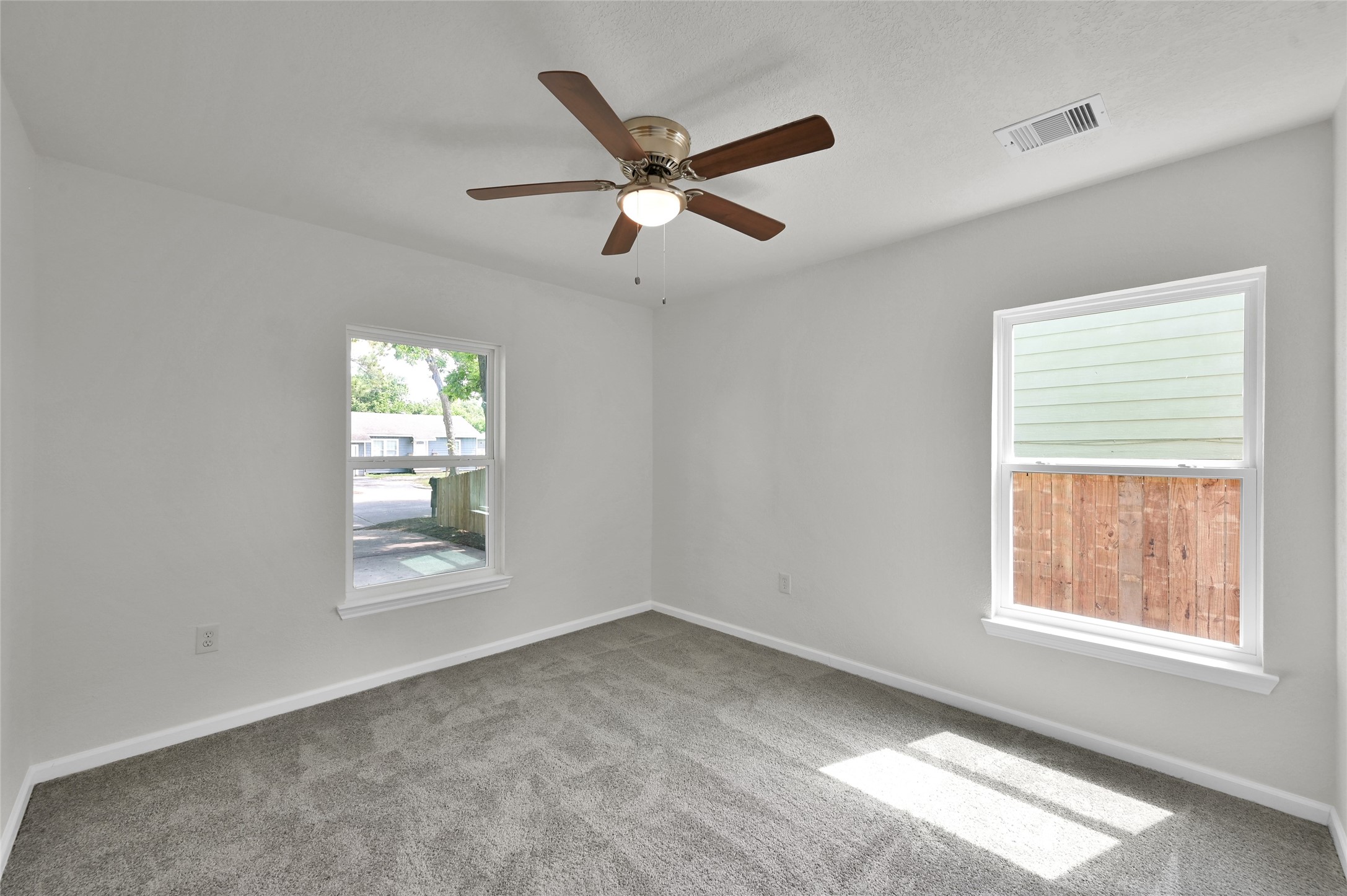 2826 Hopper Road Houston, TX 77093 - Photo 16 of 24 a view of an empty room with a window