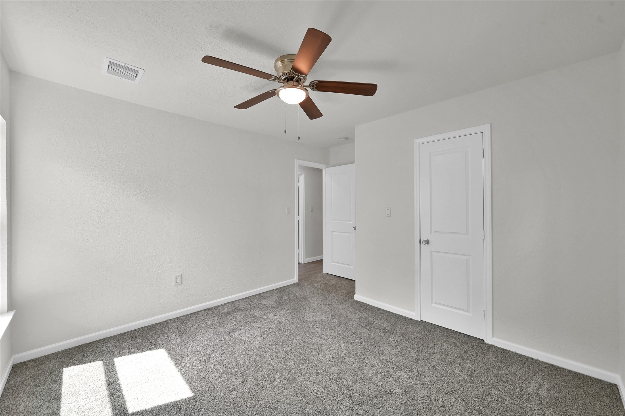 2826 Hopper Road Houston, TX 77093 - Photo 17 of 24 a view of an empty room