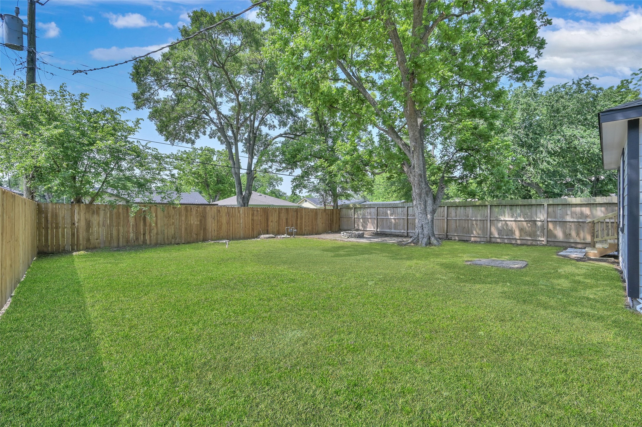 2826 Hopper Road Houston, TX 77093 - Photo 23 of 24 a view of a backyard with a trees