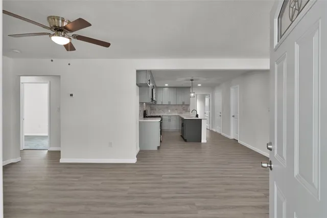 a view of a kitchen with a sink and dishwasher