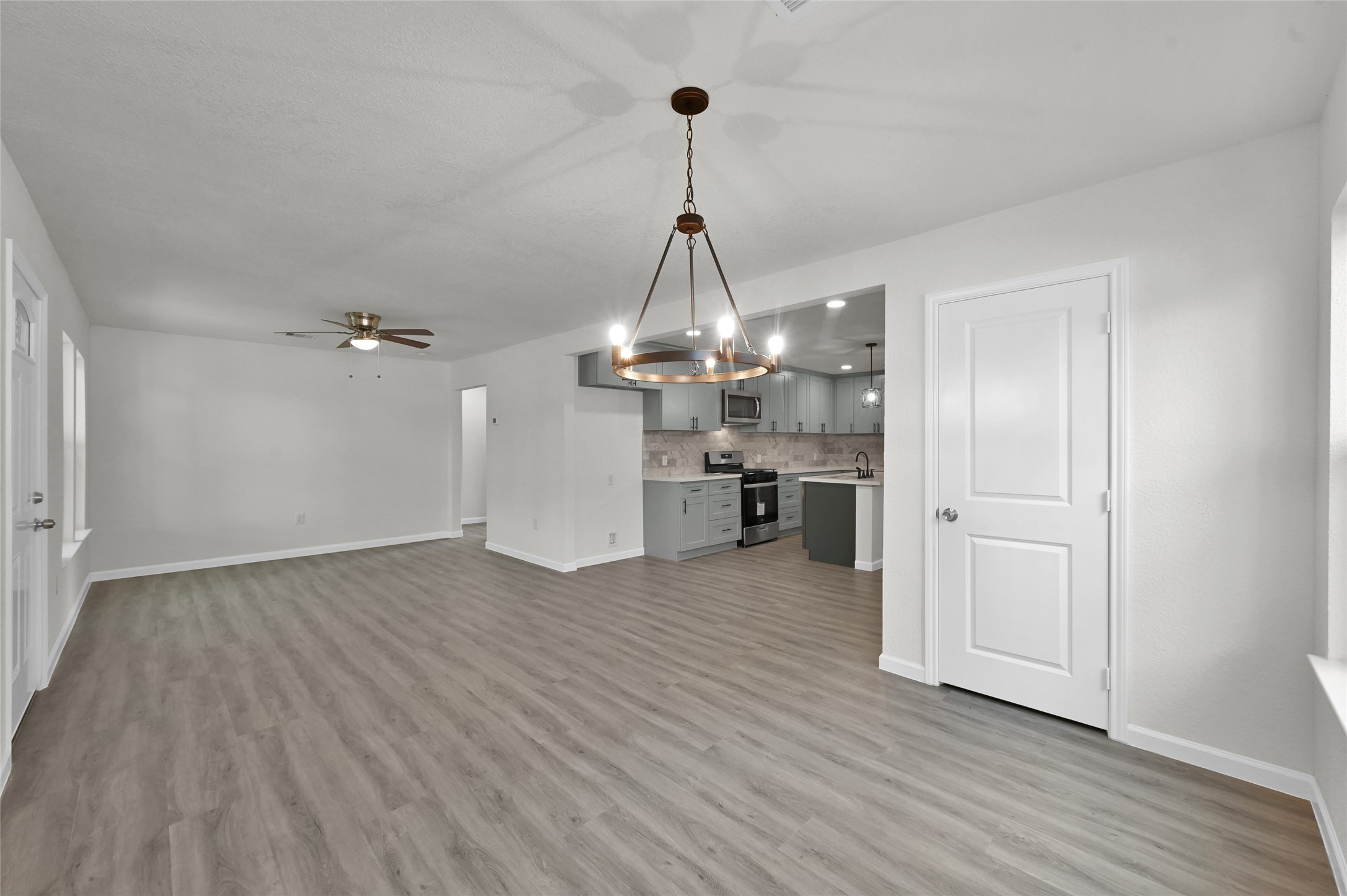 2826 Hopper Road Houston, TX 77093 - Photo 8 of 24 a view of a kitchen and wooden floor