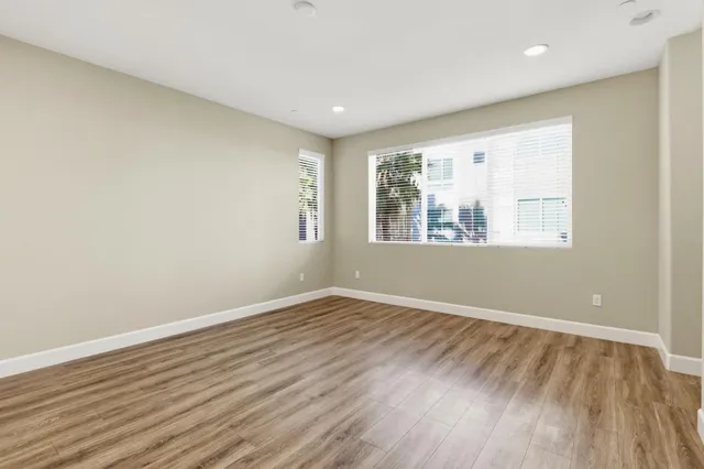 a view of kitchen with wooden floor