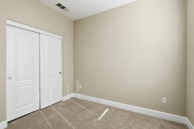 an empty room with closet