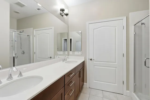 a kitchen with granite countertop a sink and a window